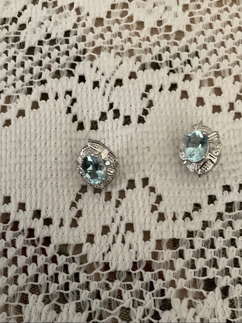 BEAUTIFUL PALE BLUE OVAL ZIRCONIA STONE POST EARRINGS, IN SILVER BASE DESIGN.